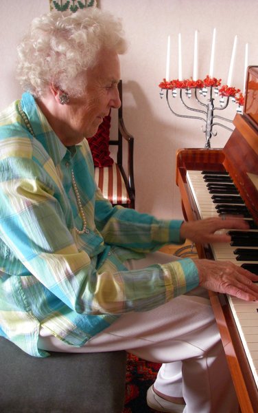 old lady playing the piano